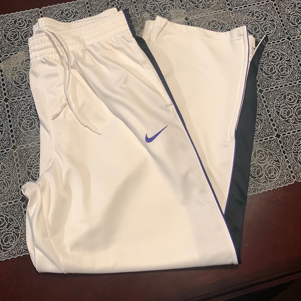 White Nike gym pants.
